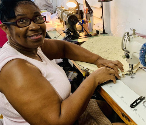 Artisan at a sewing machine