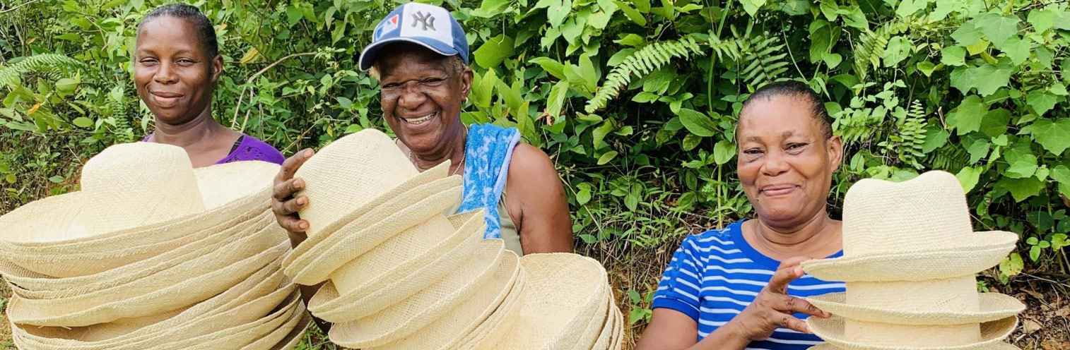 Jamaican artisans with their handwoven hats